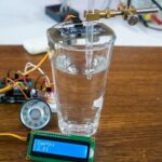 water-container-ultrasonic-sensor-lcd-display-water-level-dfplayer-mini-arduino-speaker